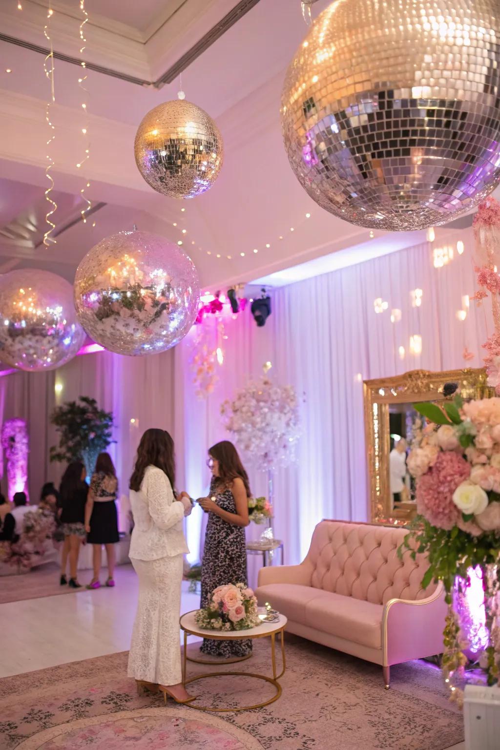 Disco spheres introduce a glamorous touch to the celebration.