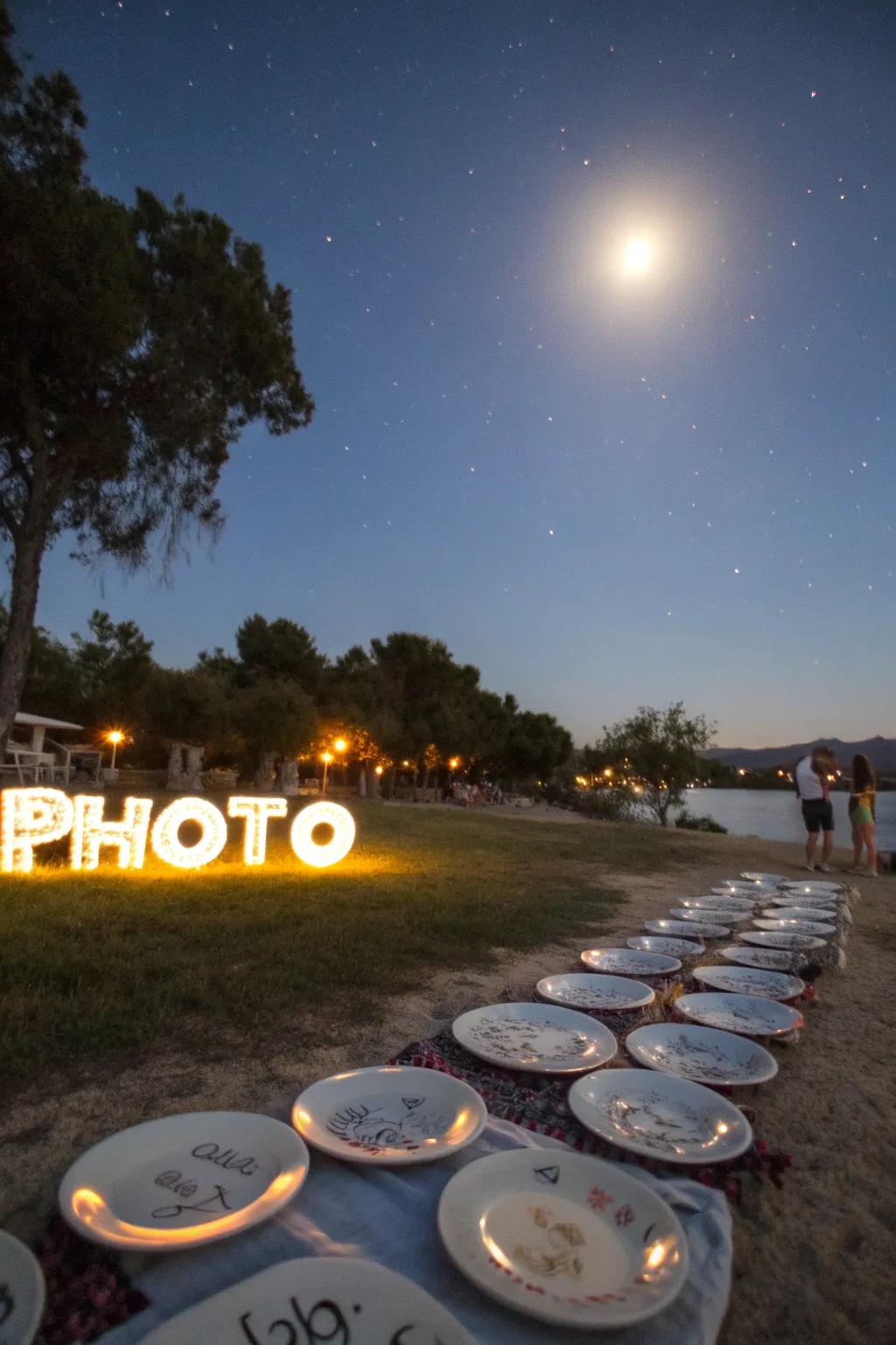 An outdoor ceremony beneath a full moon, showcasing plates filled with heartfelt sentiments.