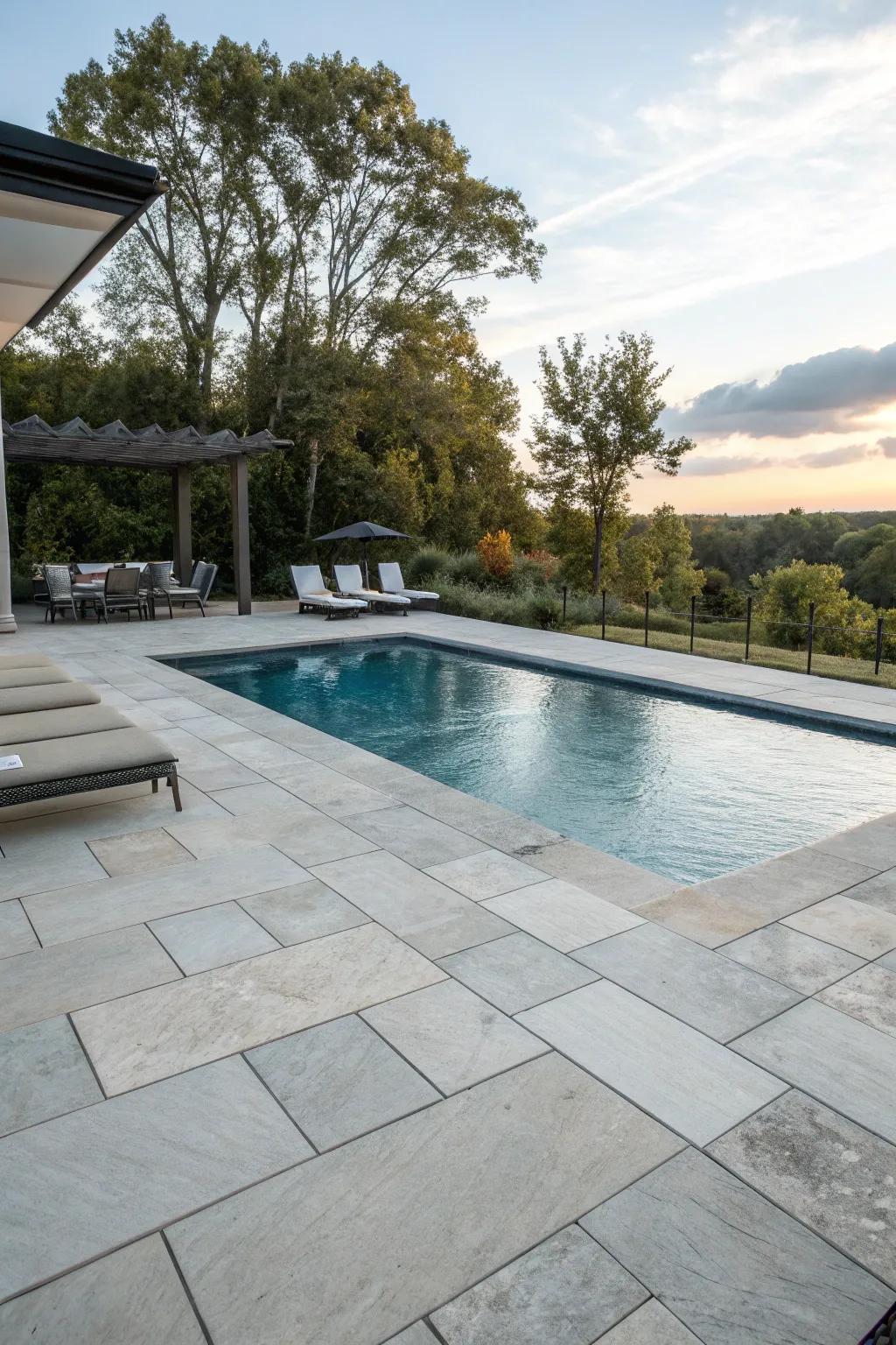 Enjoy durability and style with a stone and tile pool deck.