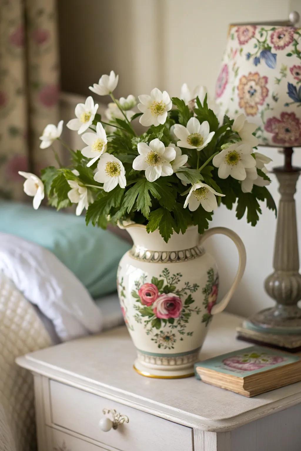 Charming anemone bouquet adding whimsy to a bedroom.