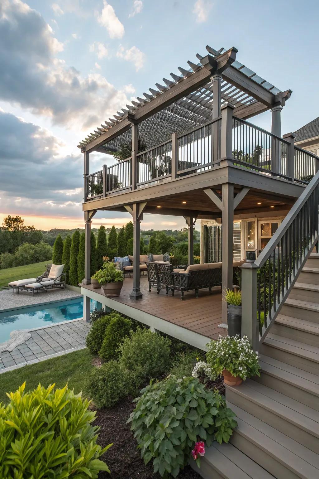 Multi-tiered decking combined with a pergola elevates the aesthetics of any poolside.