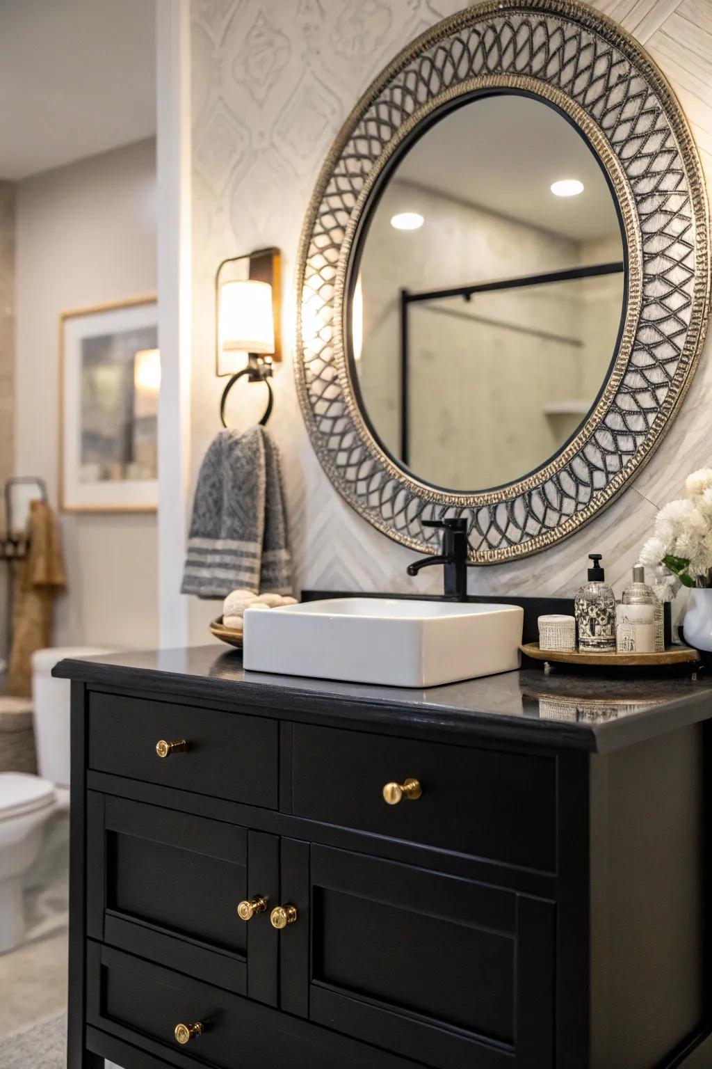 A statement mirror above a dark sink cabinet can turn the bathroom into a work of art.