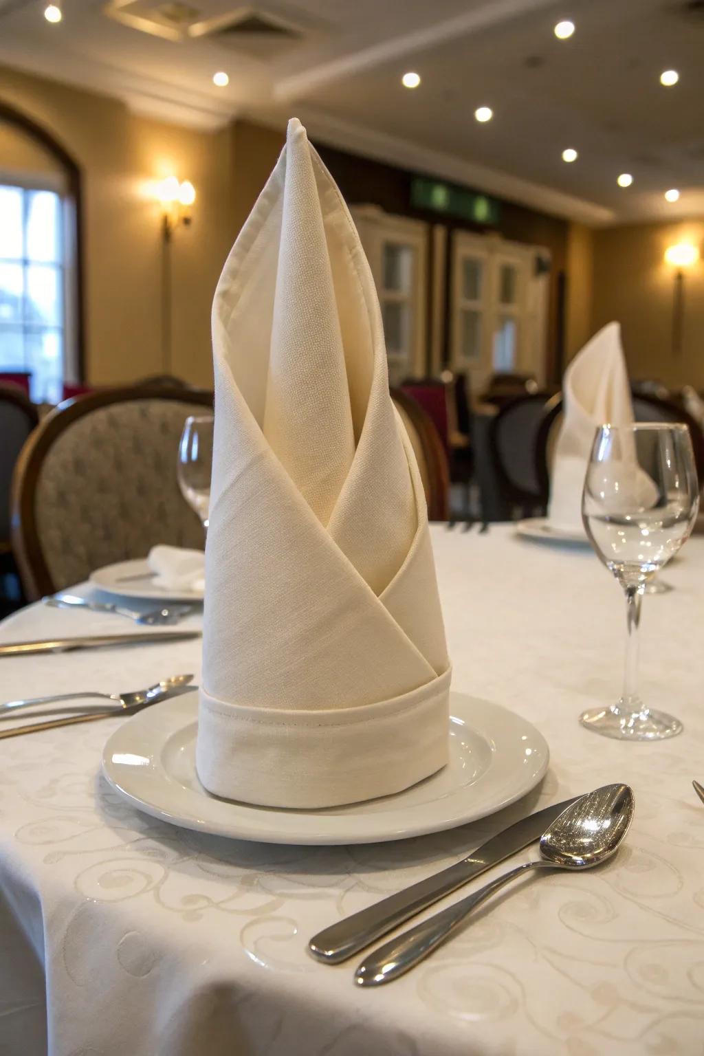 The Bishop’s Hat napkin fold adds a sophisticated touch.