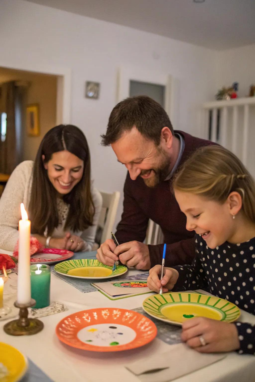 A family enjoying the experience of writing and smashing plates together.