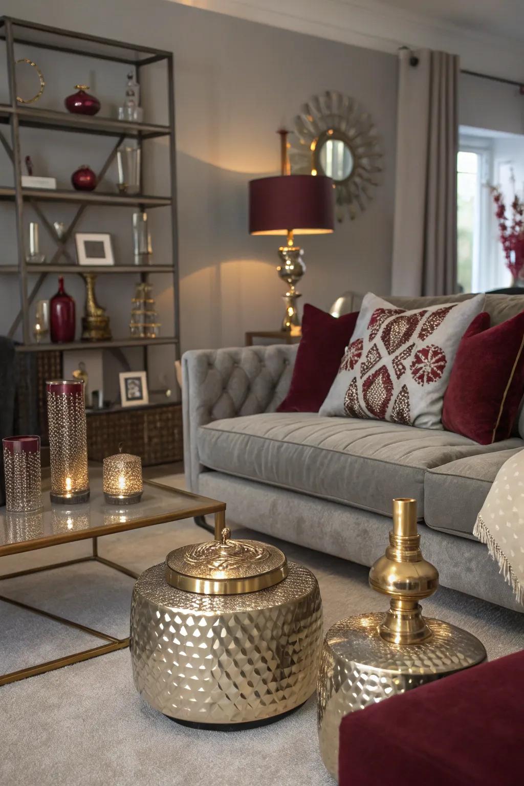 Living area featuring metallic touches and a neutral and crimson color scheme.