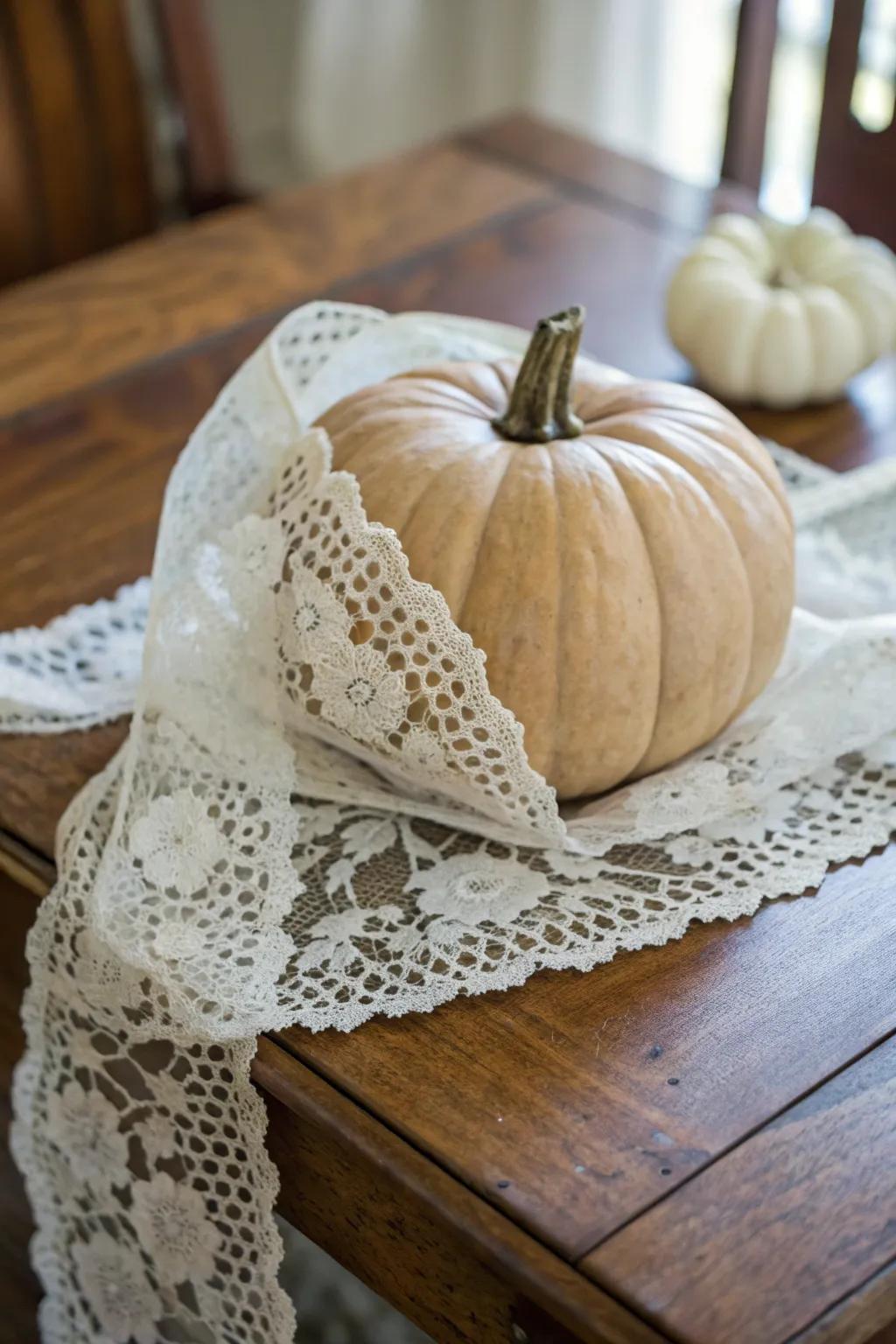 Lace-wrapped pumpkins exude elegance and charm.