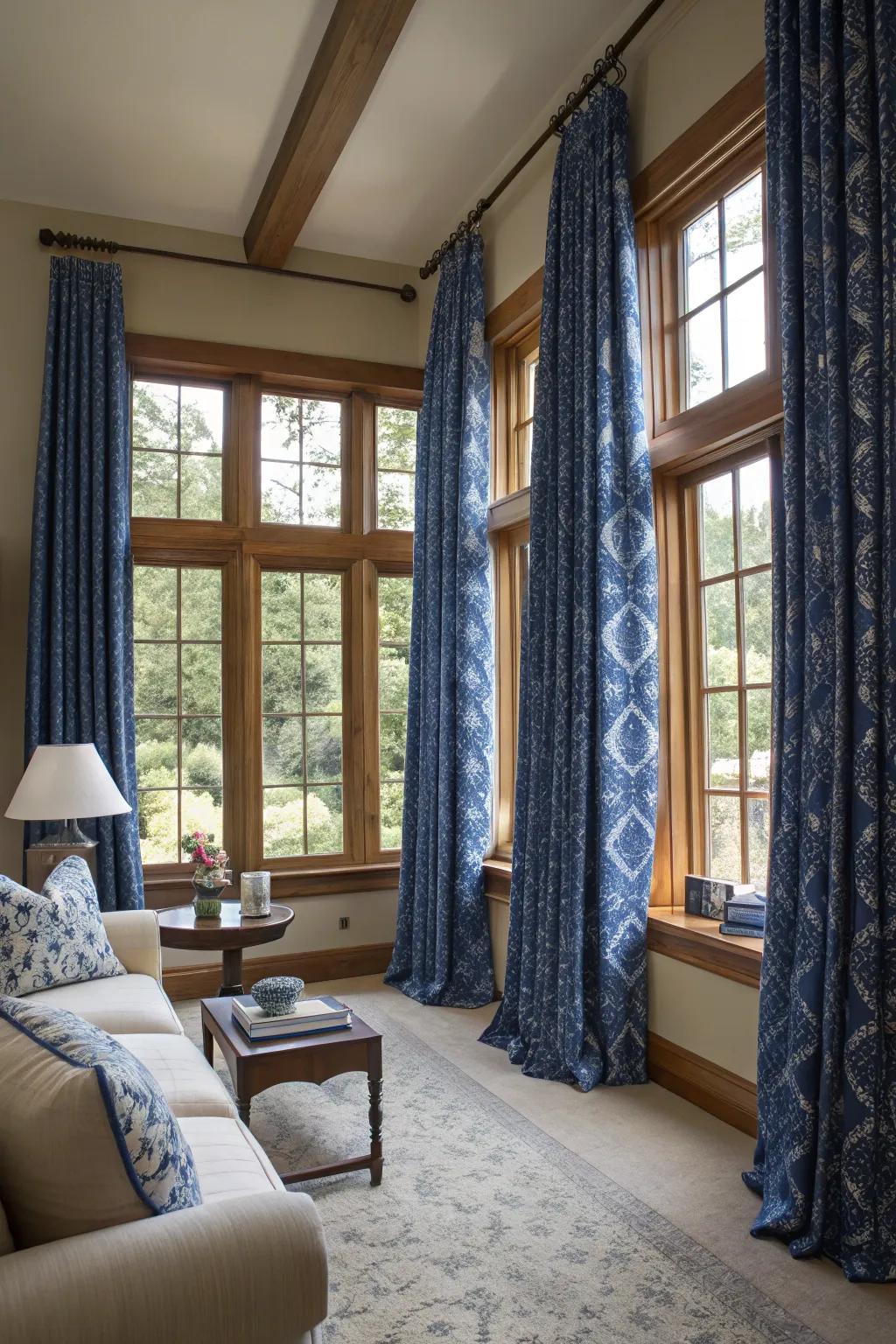 Patterned curtains in royal blue create a sophisticated frame for your living space.