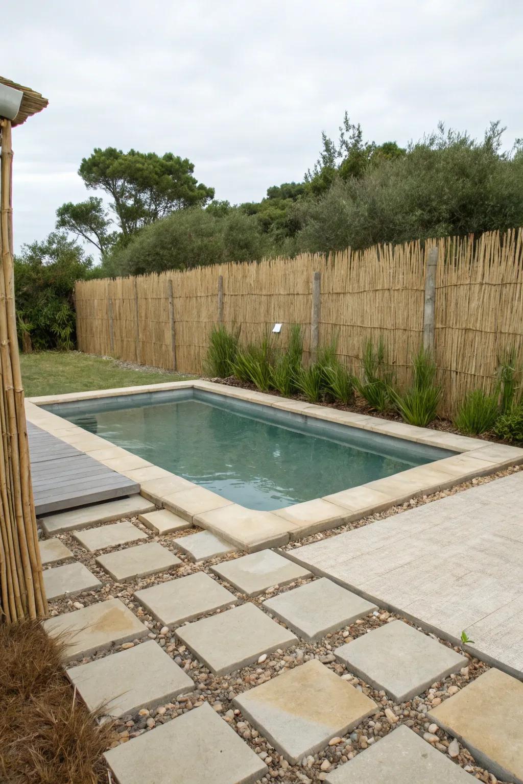 A stem barrier establishing a tranquil, beach-like atmosphere near the pool.