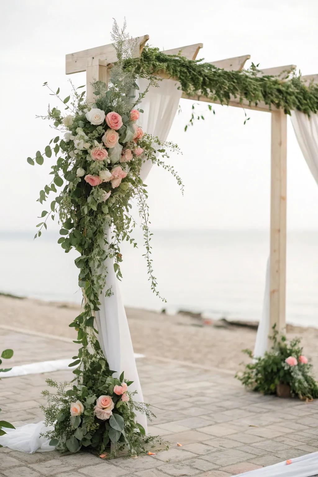 A simple arch with greenery and flowers frames the ceremony beautifully.