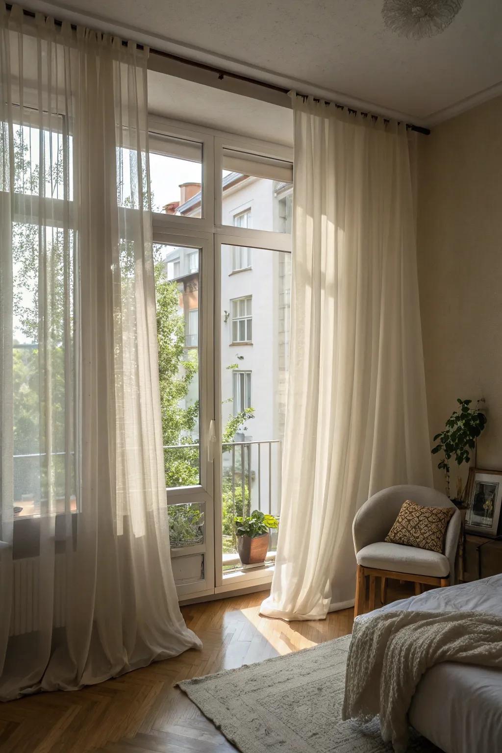 Long window coverings make a small apartment feel taller and brighter.