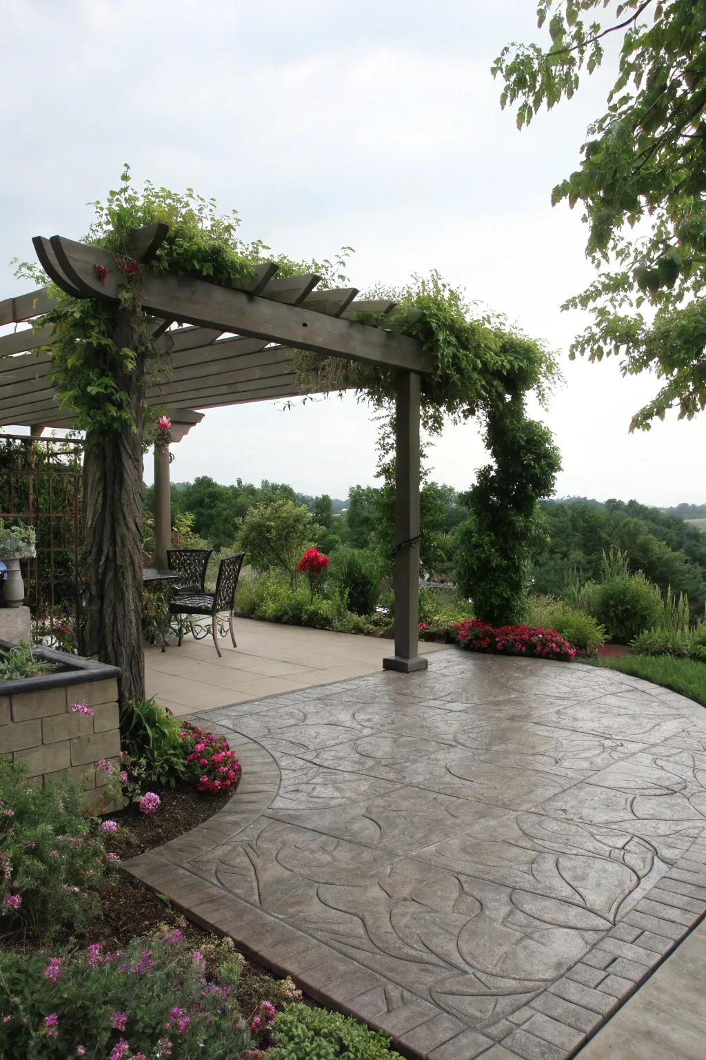 A stamped concrete patio shaded by an elegant pergola.