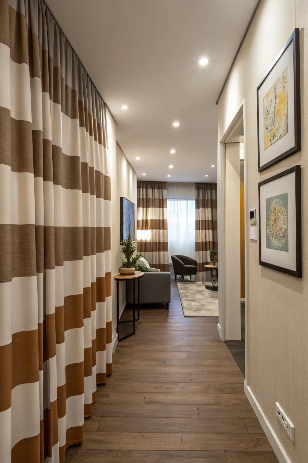 Horizontal stripes in duo-tone drapes widening a narrow hallway.
