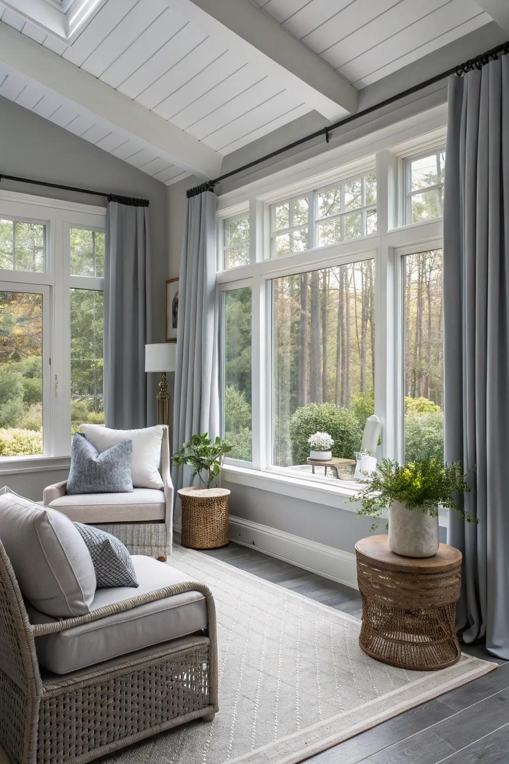 A sunroom with delicate silver walls, embodying contemporary calm and sophistication.