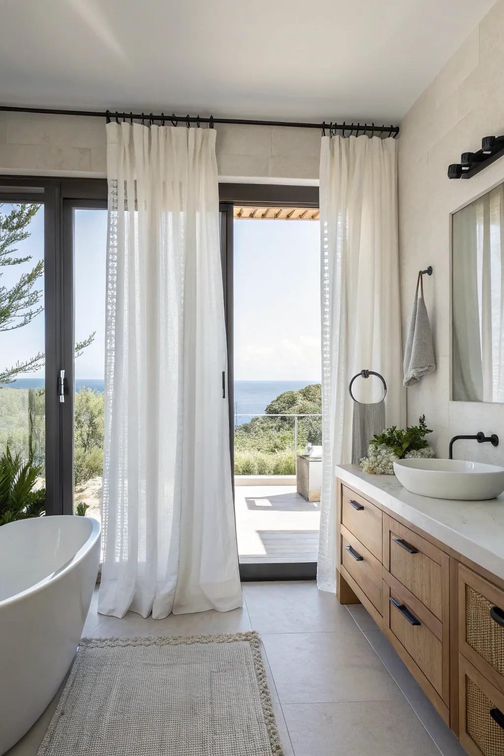 Simple curtains offer a smooth and modern look for a contemporary bathroom.