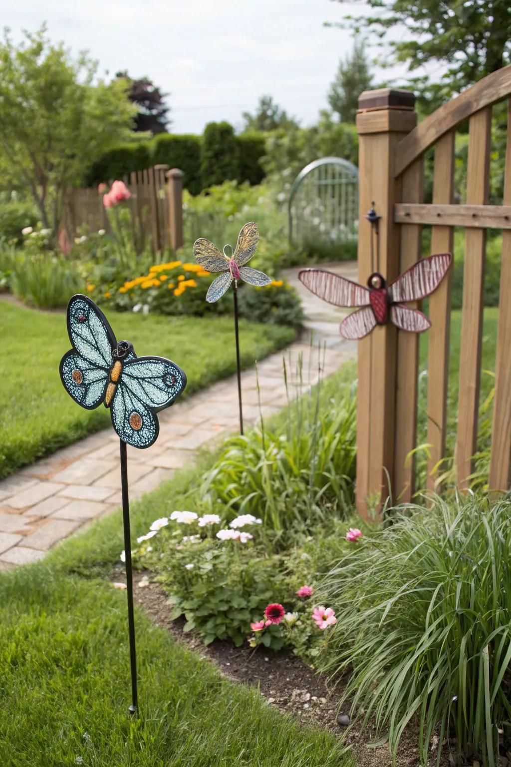 Insect art bringing a playful touch to the blooms.