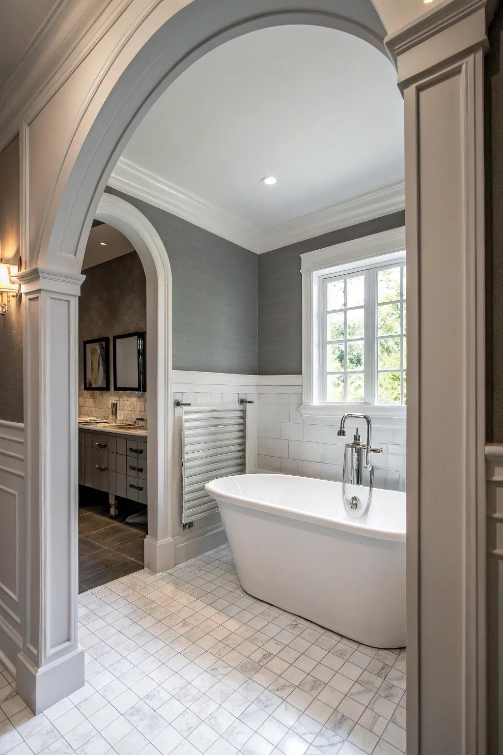 Grey walls with white aspects create a classic and balanced restroom design.