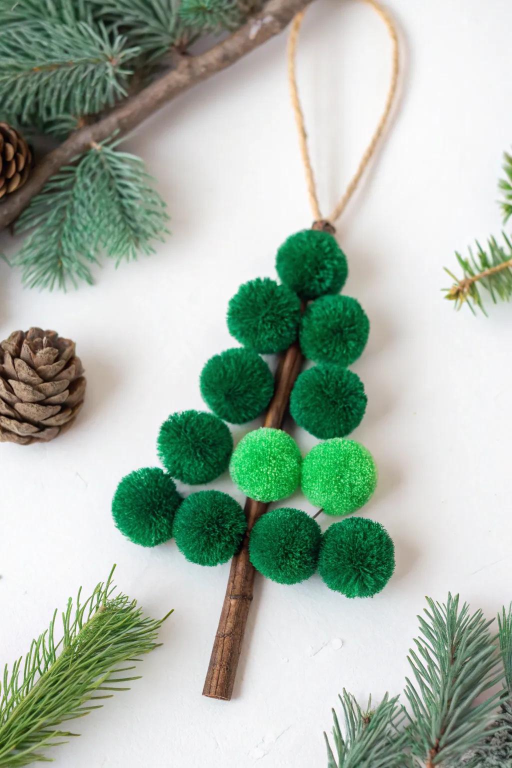 A delightful pom-pom Christmas tree, adding a burst of color and texture to holiday decor.