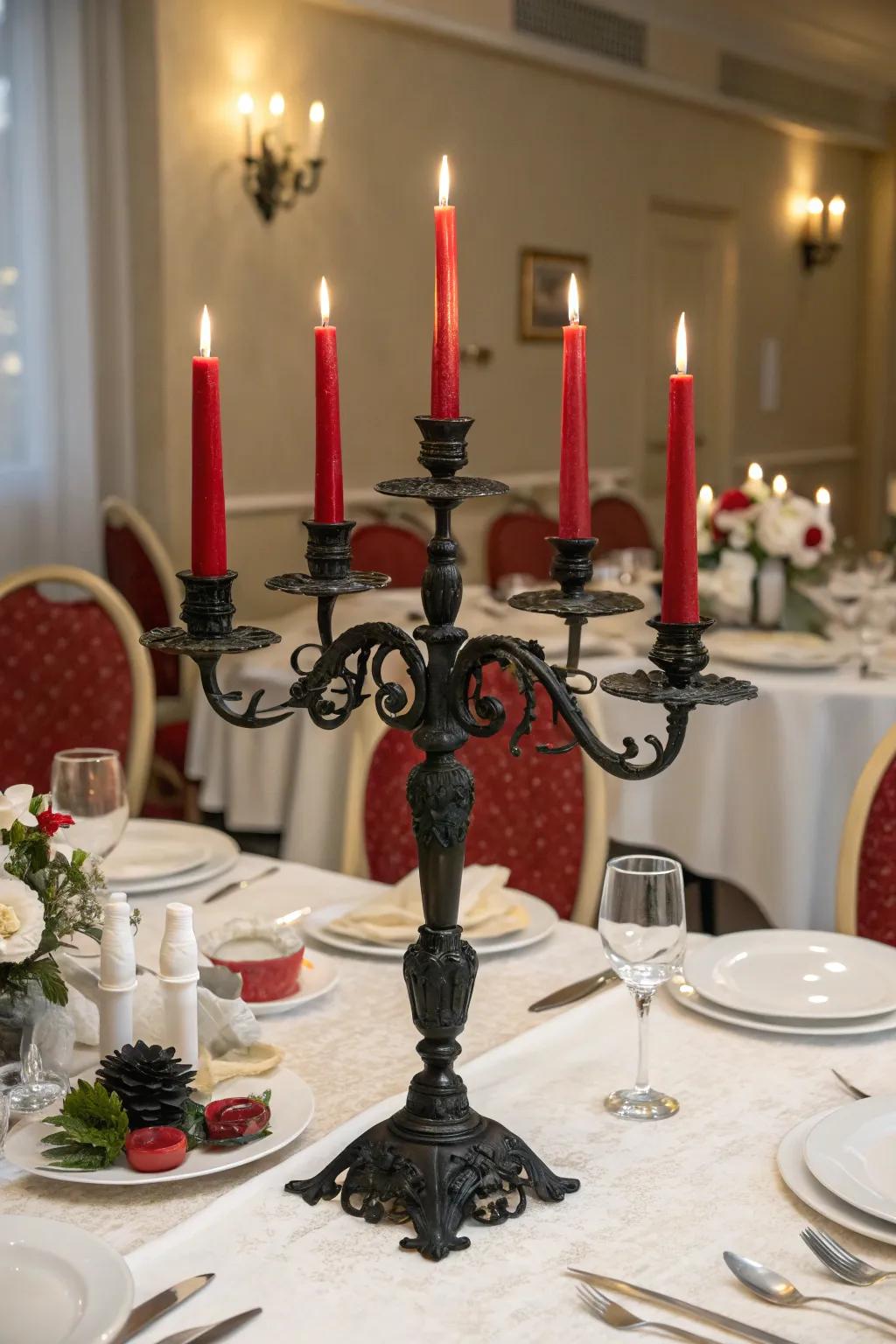 Established refined dining installation which involves a charcoal candelabra plus tapered scarlet lights.