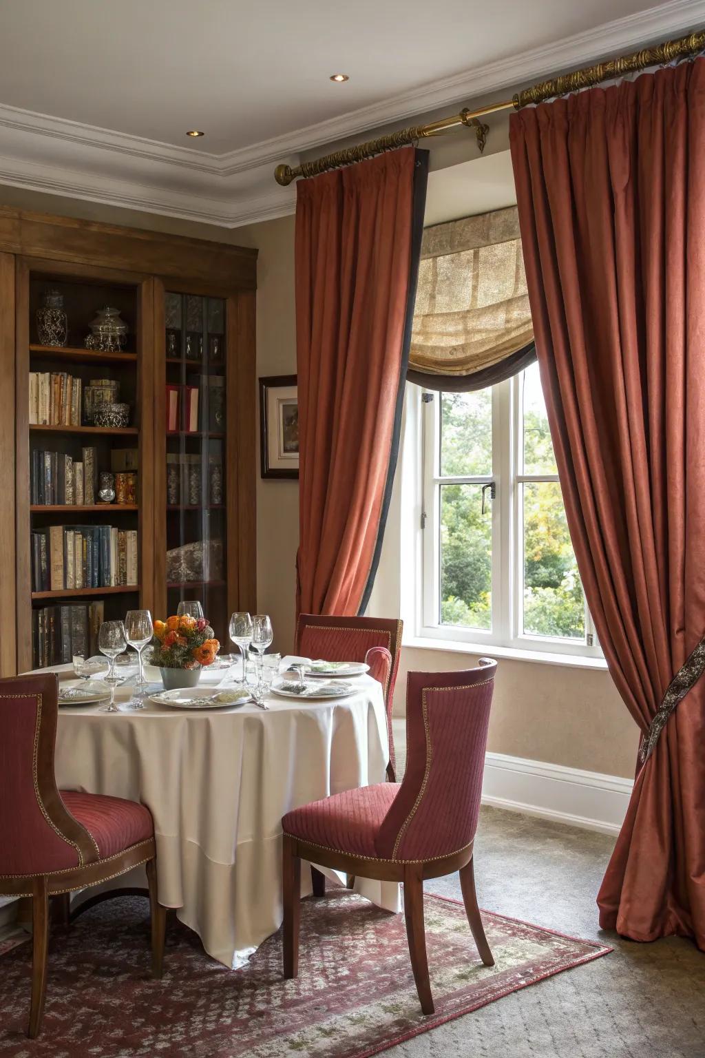 Rich drapes bring drama and elegance to a small dining area.