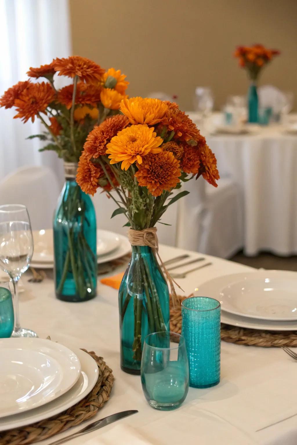 Unique centerpieces that captivate with seafoam green and sunset orange.