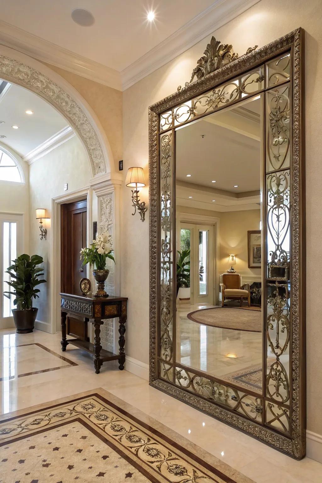 A decorative mirror reflects light, adding depth to this entryway.