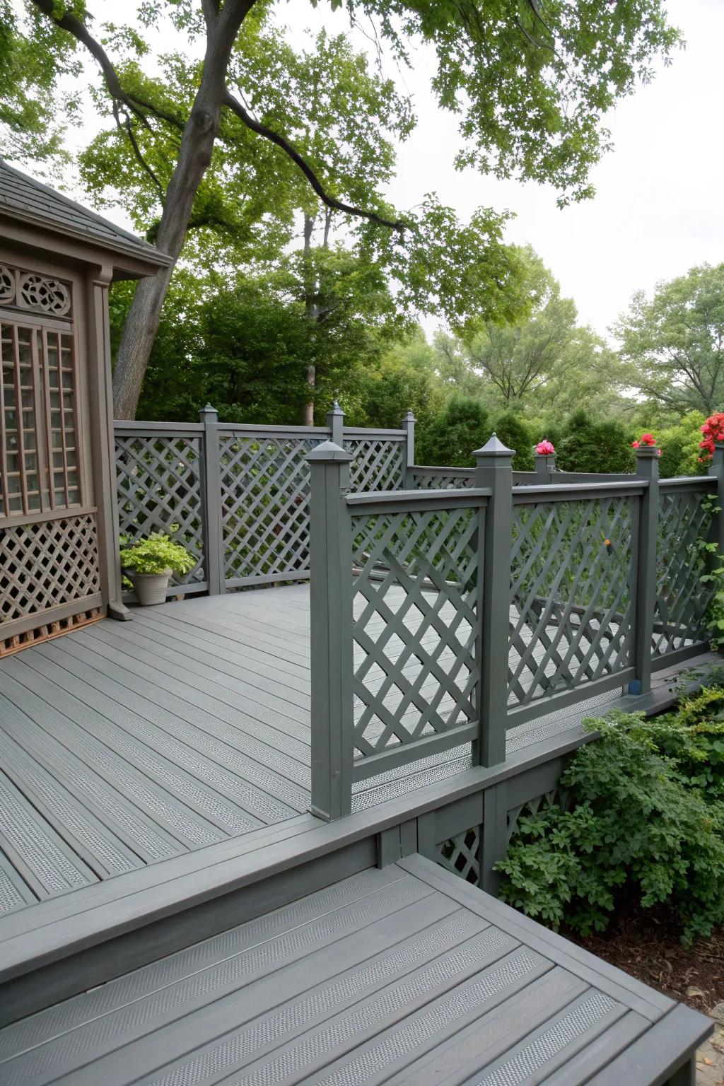 Grey deck featuring lattice railings that enhance privacy.