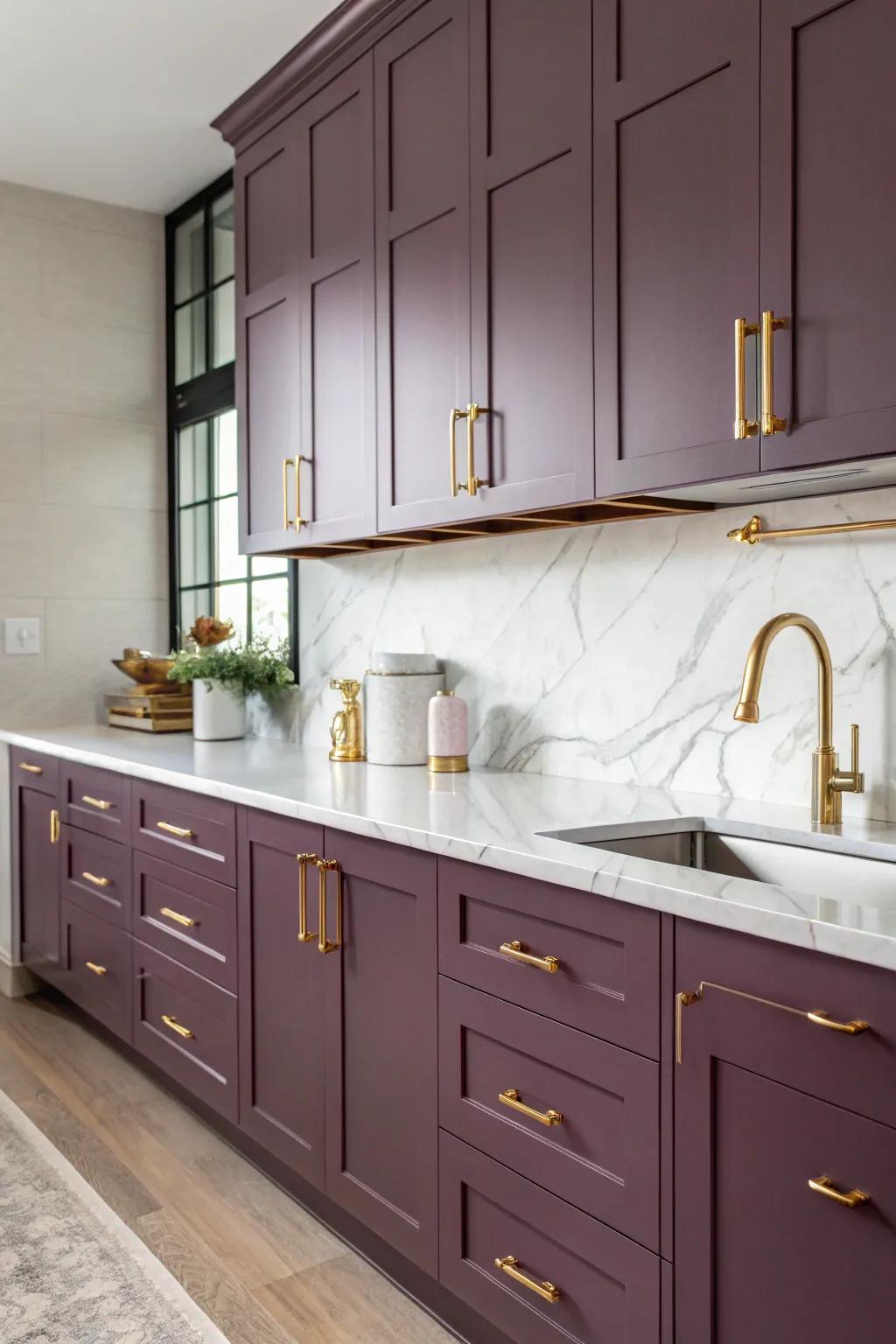 Plum cabinets paired with gold accents bring luxury to the kitchen.