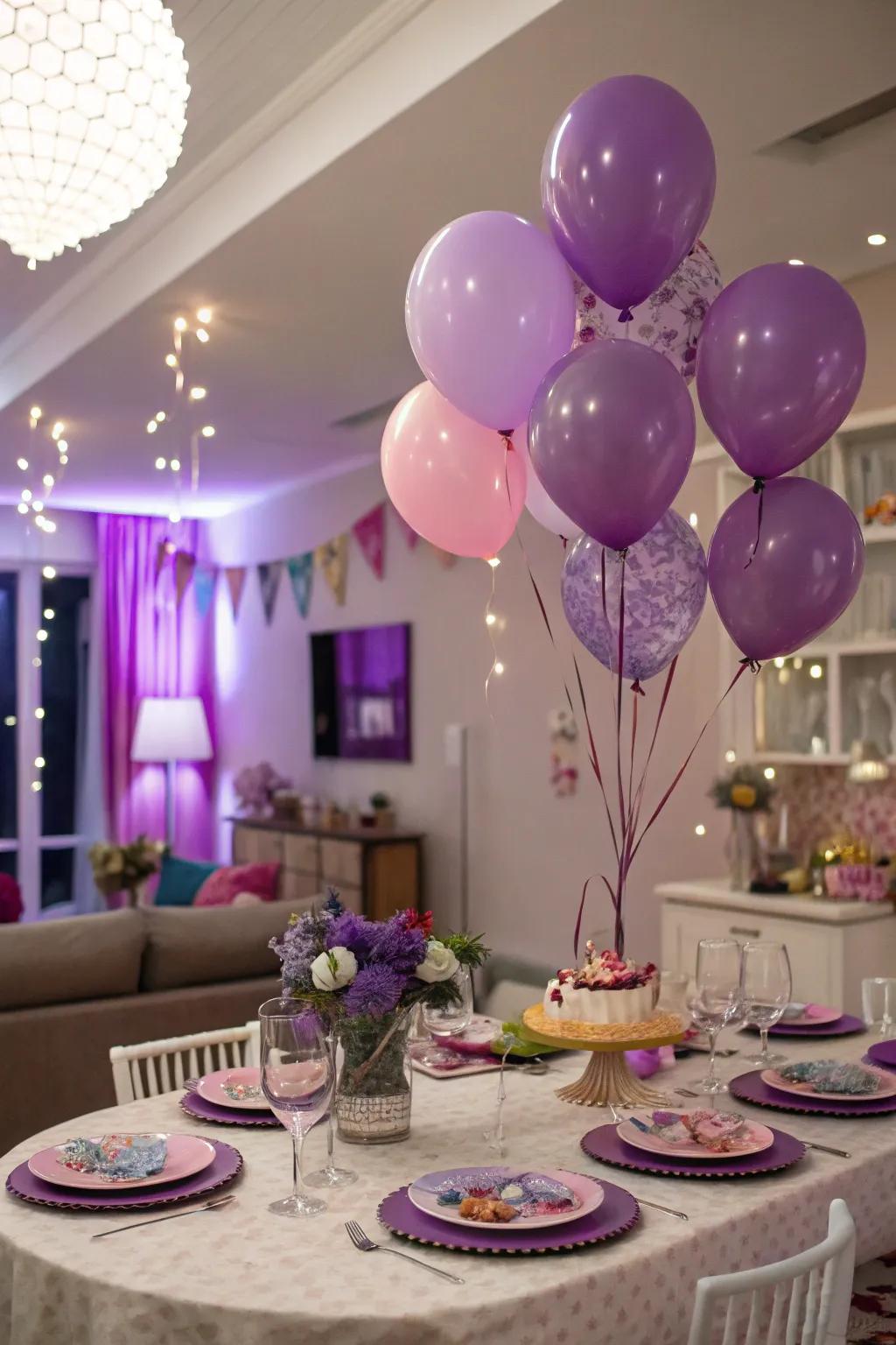 A festive celebration setting adorned with purple balloons and tableware.