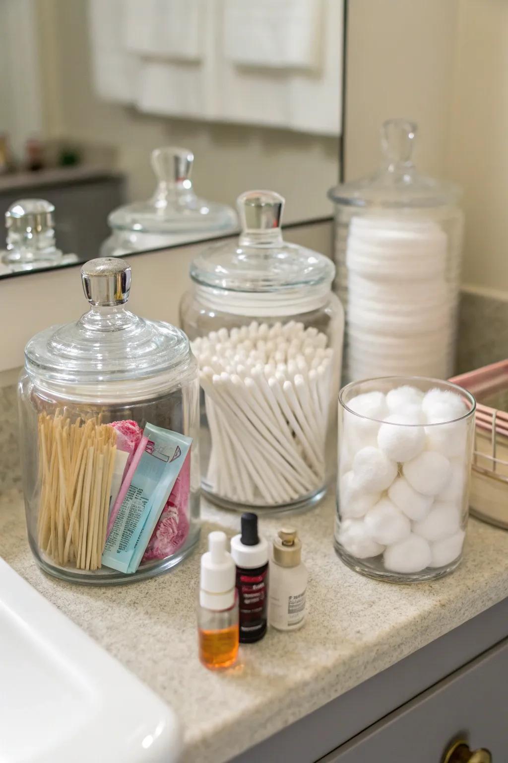Organized cannisters keep bathroom must-haves tidy and stylish.