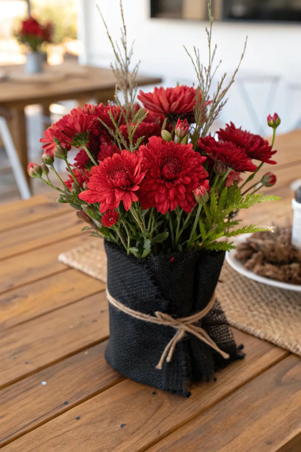 Country display featuring scarlet flowerings covered via charcoal burlap.