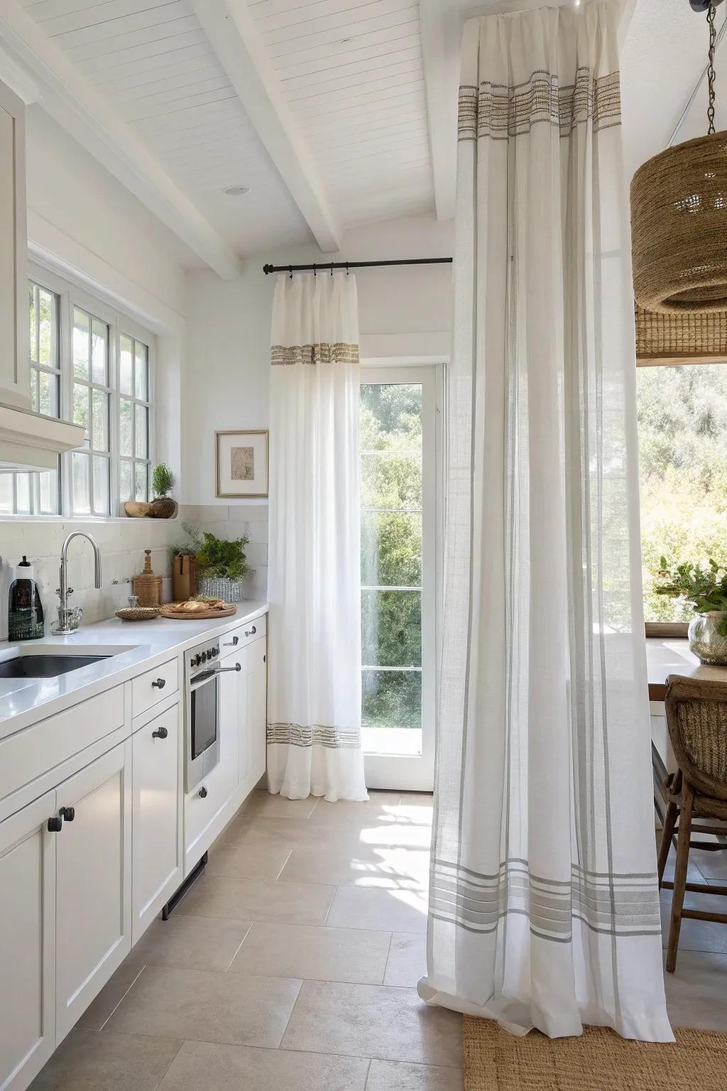 Subtle stripes on white curtains create a clean, modern look in this kitchen.