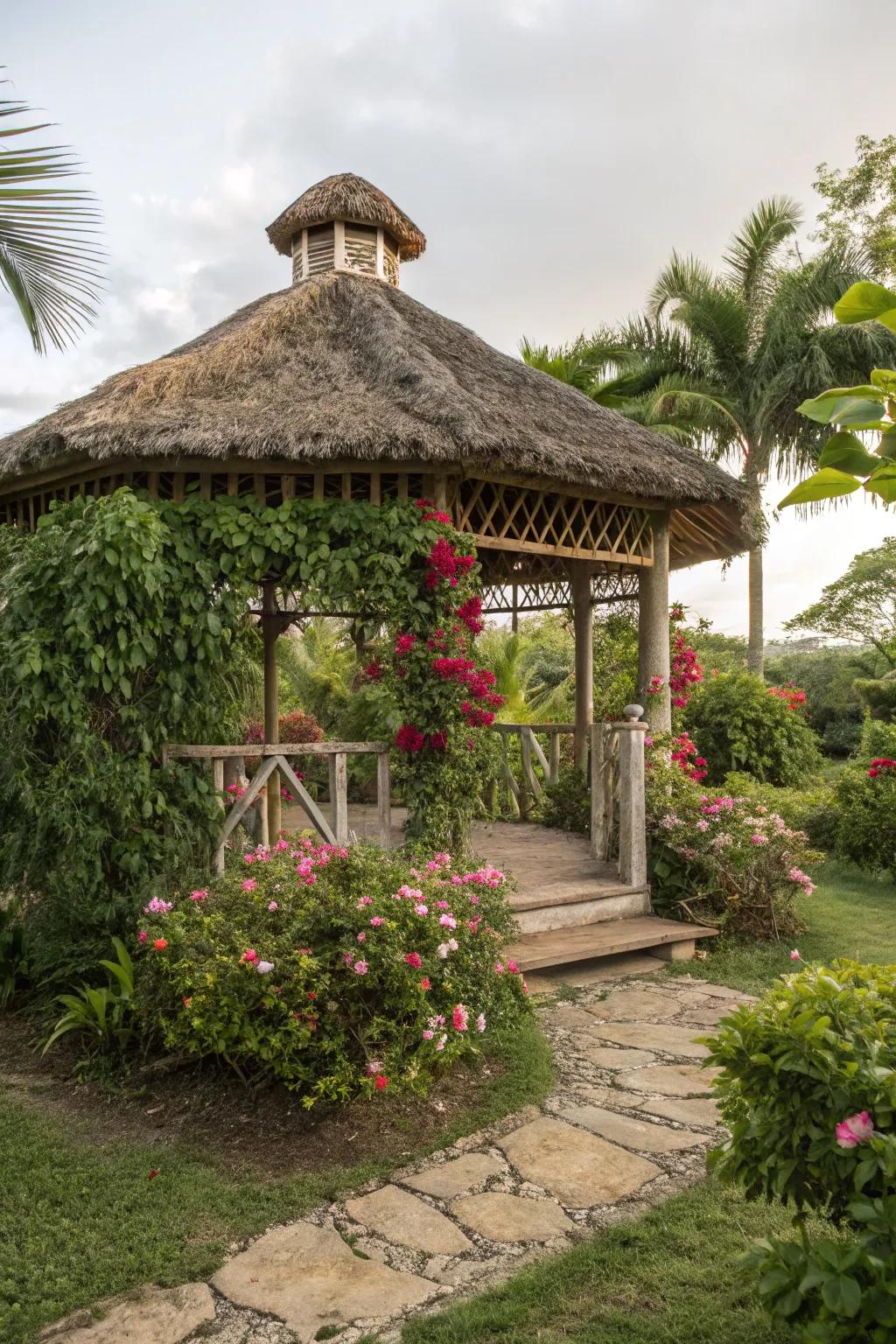 A gazebo with a thatched roof, perfect for a tropical garden retreat.