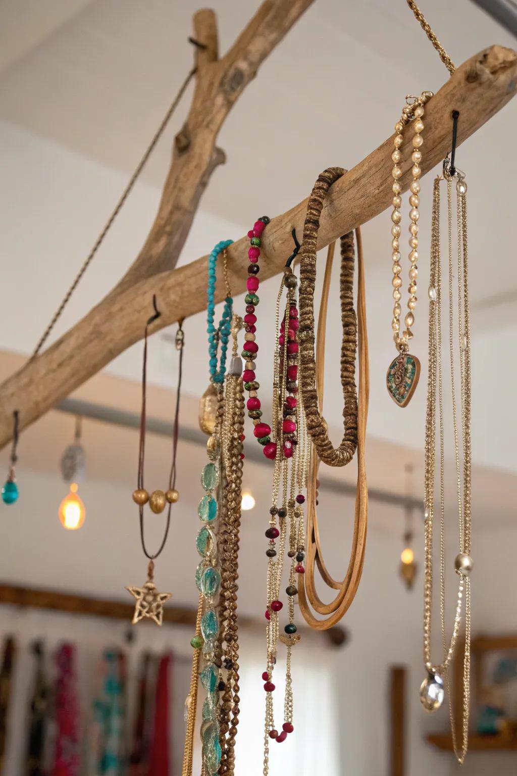A hanging branch used for jewelry display