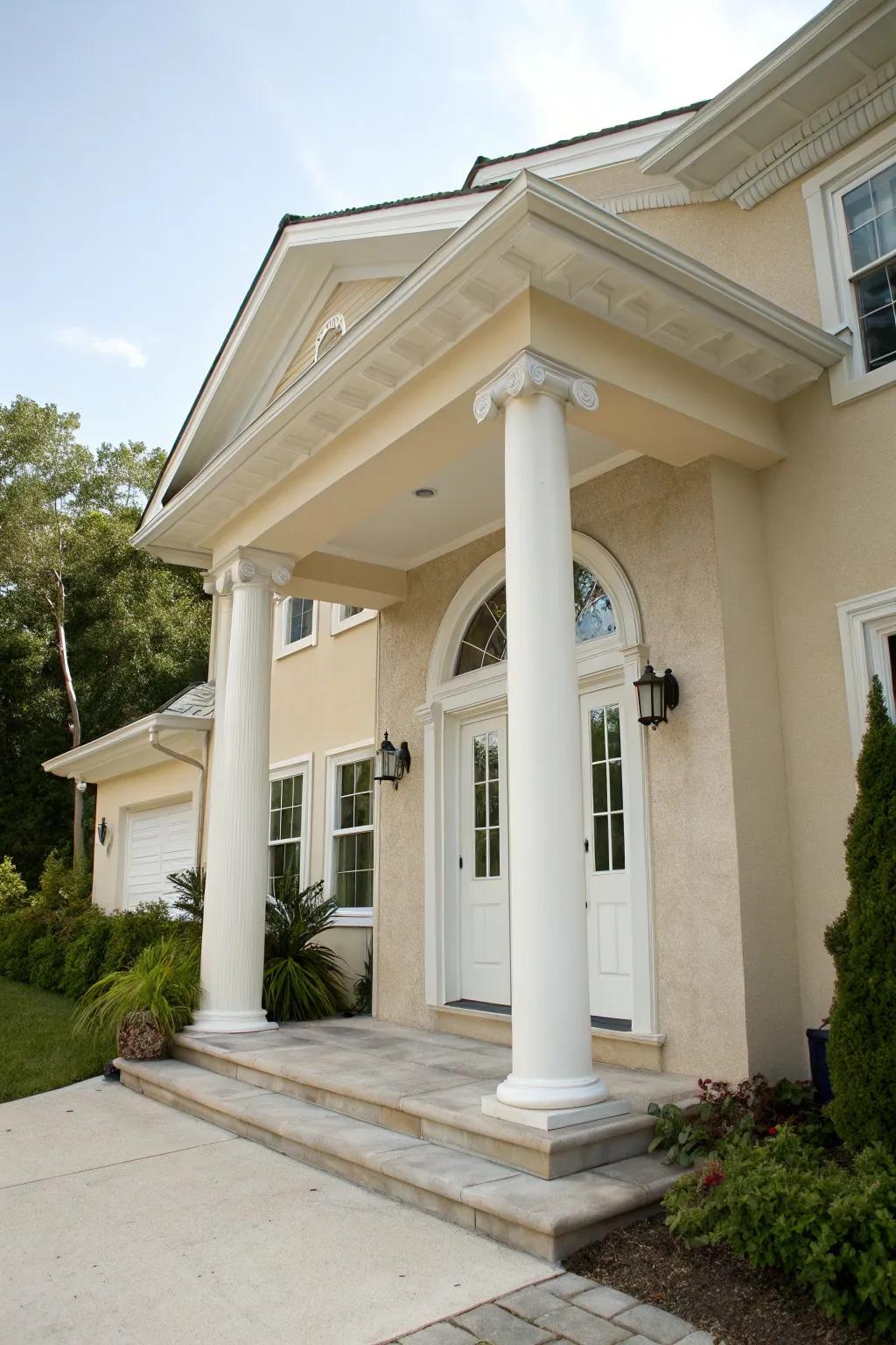 An ivory entrance maintains a clean and elegant aesthetic for a beige house.