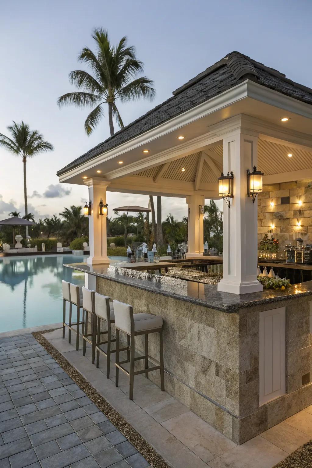 A bar pavilion featuring counter seating is the perfect location for poolside drinks and socializing.