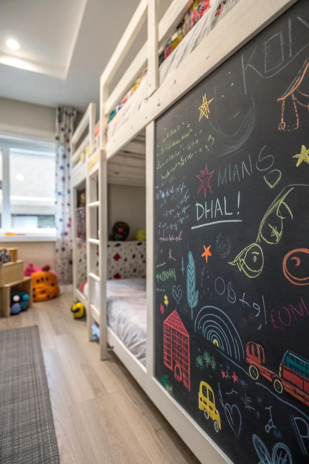 A creative chalkboard wall under the bunk bed.