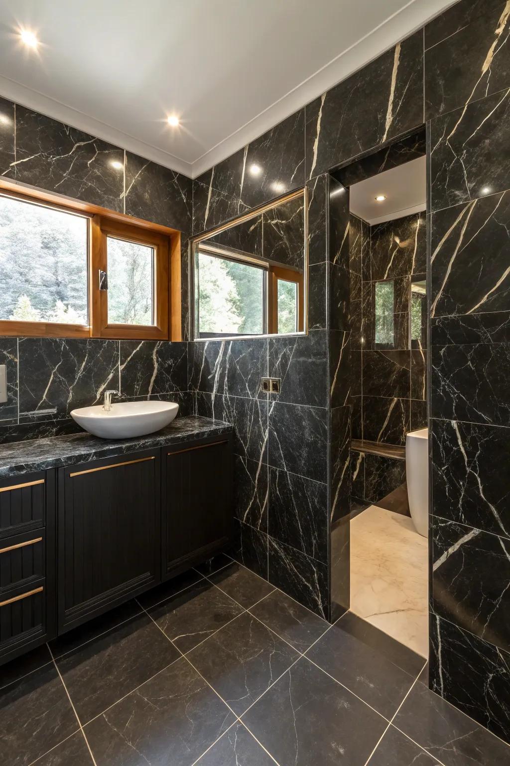 Black marble tiles bring timeless elegance to this bathroom.