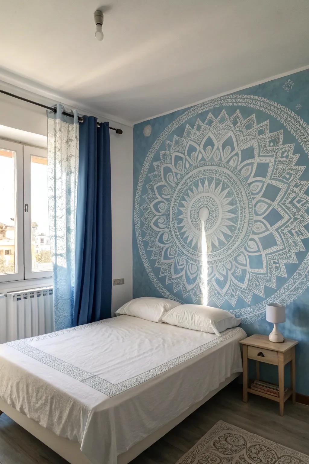 A delicate wall artwork creates a focal point in a blue and white bedroom.