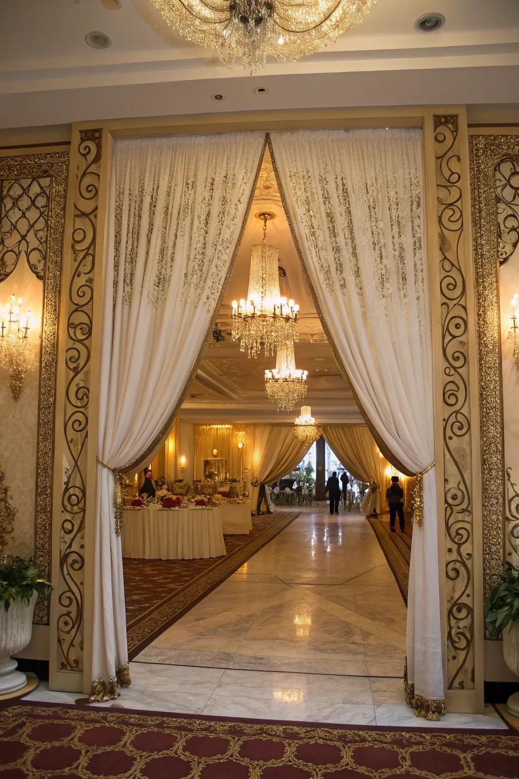 Flowing drapes craft a grand entryway, setting an elegant tone for the bridal shower.