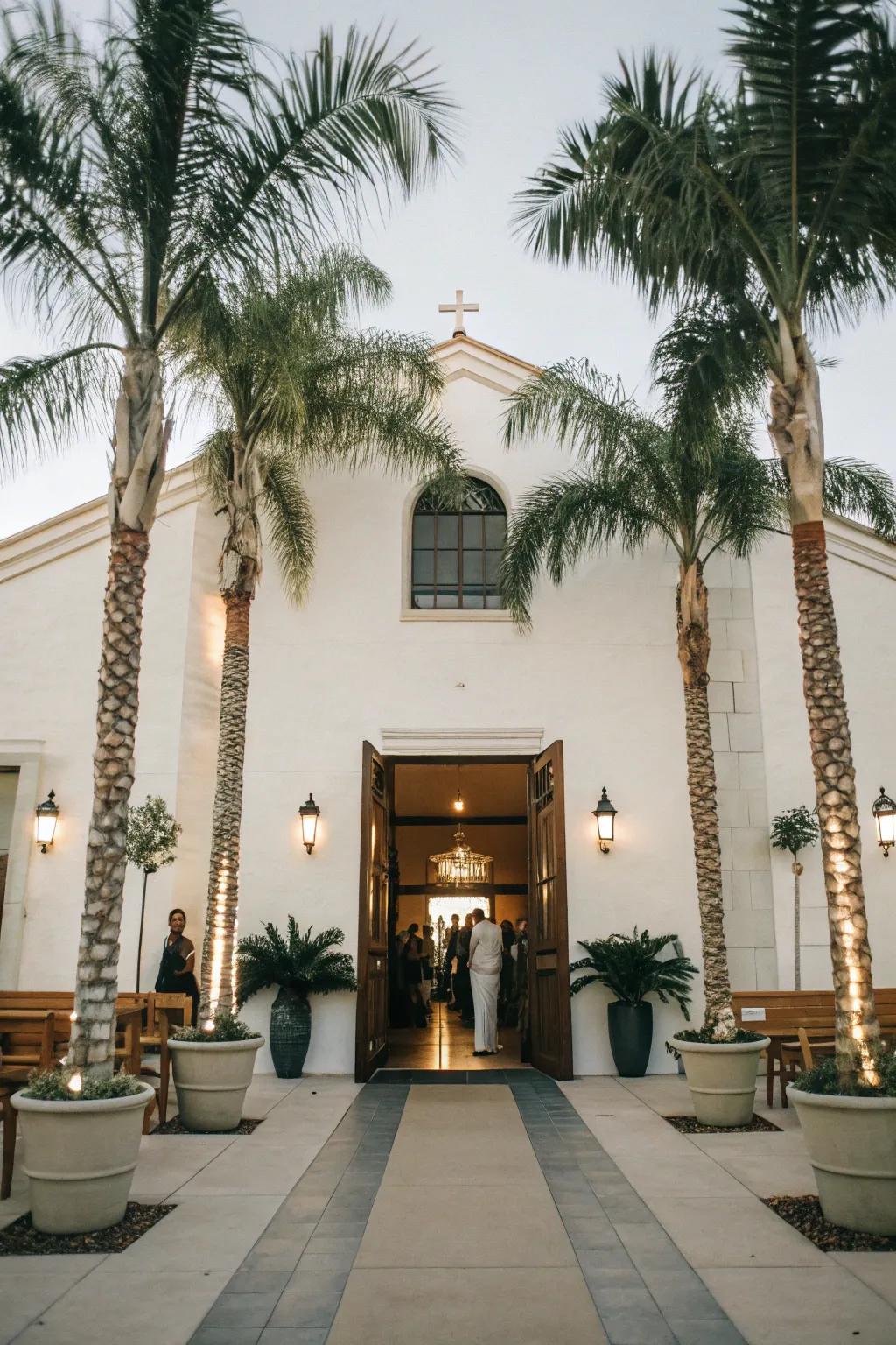 Tall potted palm sets framing the church entryway.