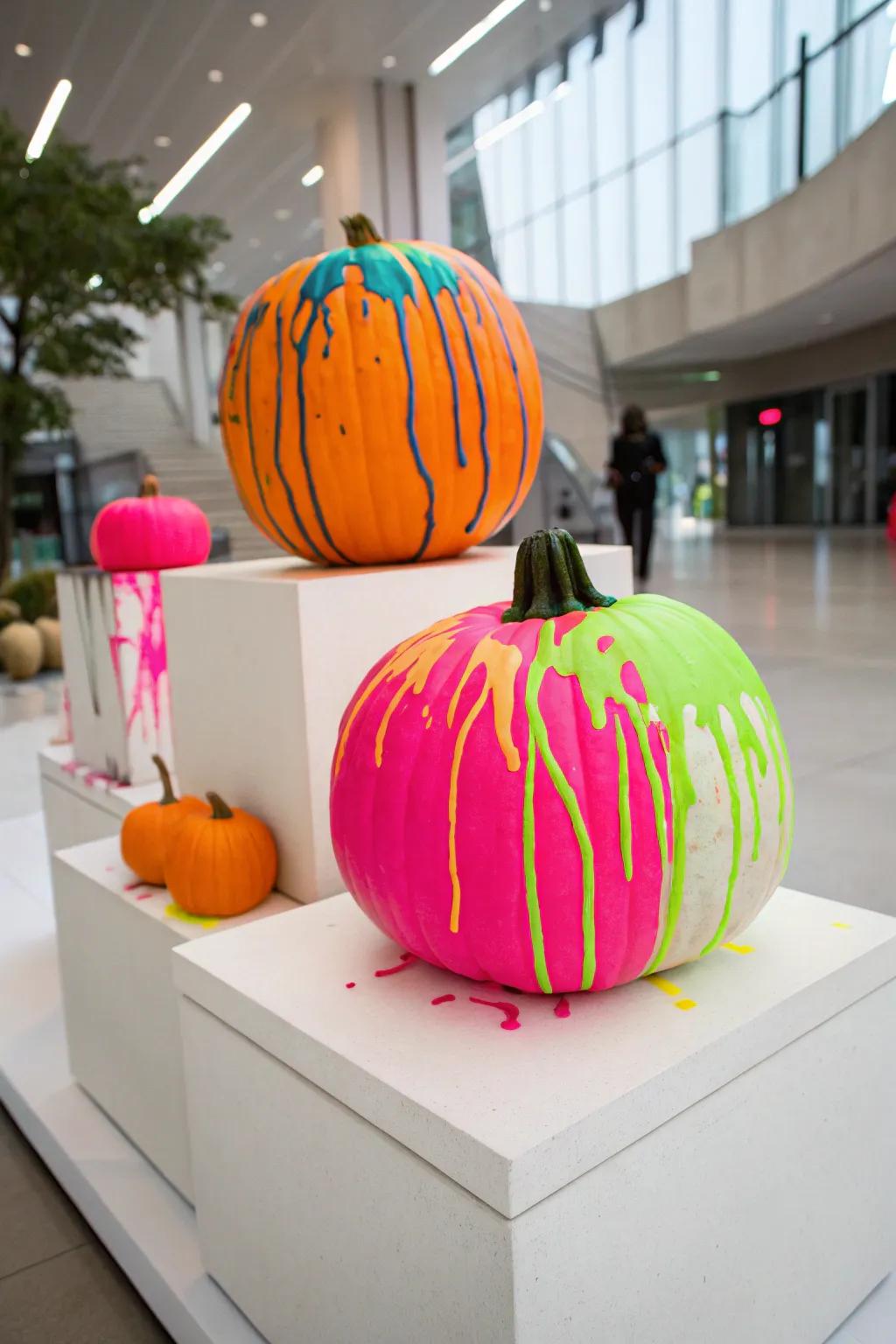 Neon drip pumpkins give a bold, modern touch to fall designs.
