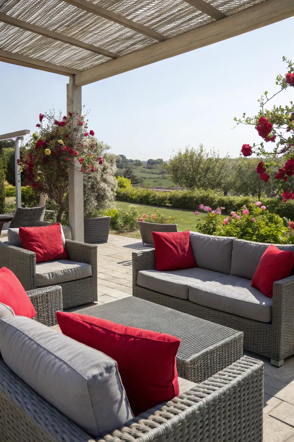An outdoor patio showcasing ash furnishings and scarlet cushions.