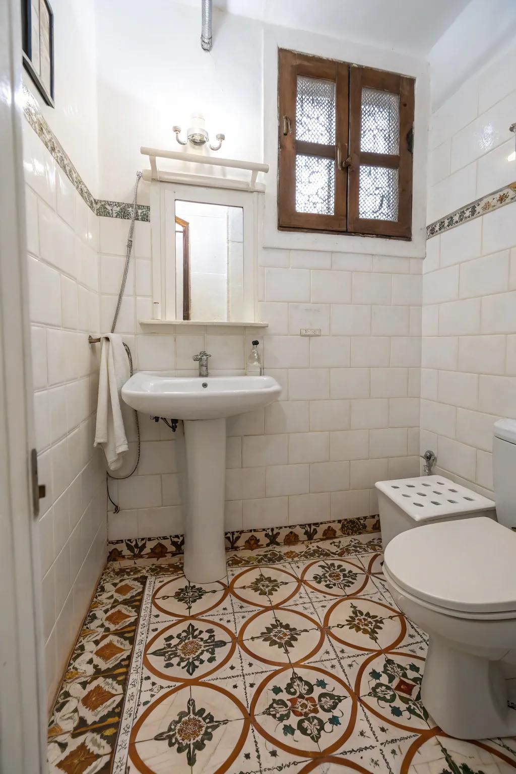 Tiles add texture and visible character to small bathrooms.