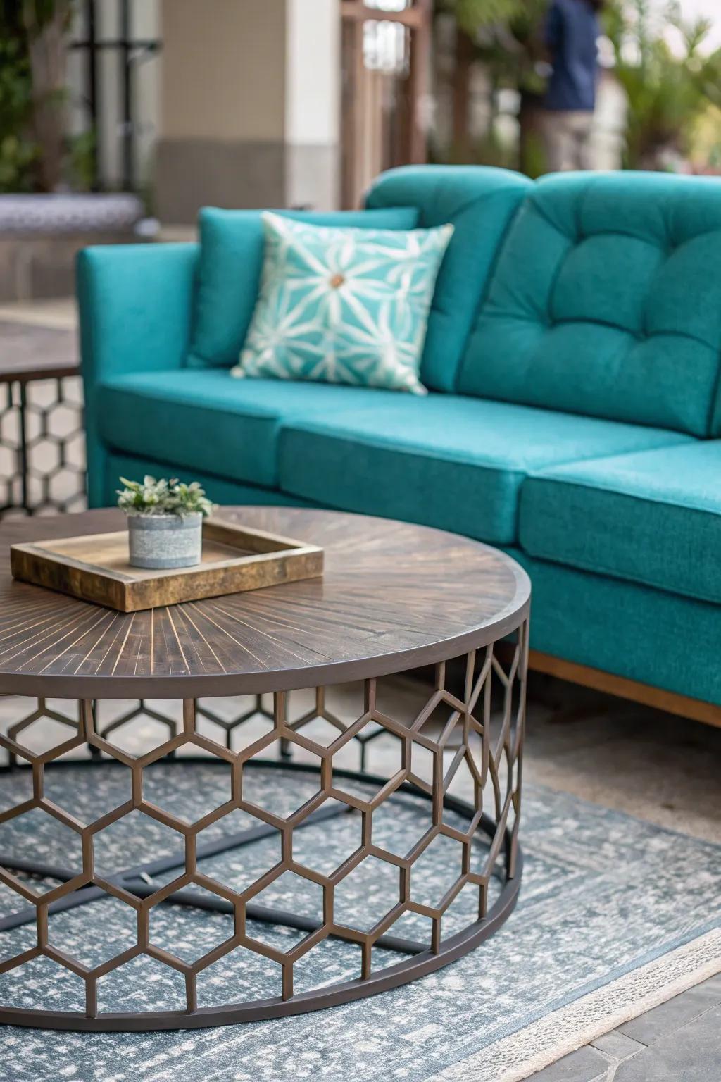 An eye-catching center table can heighten the appeal of a cerulean sofa.