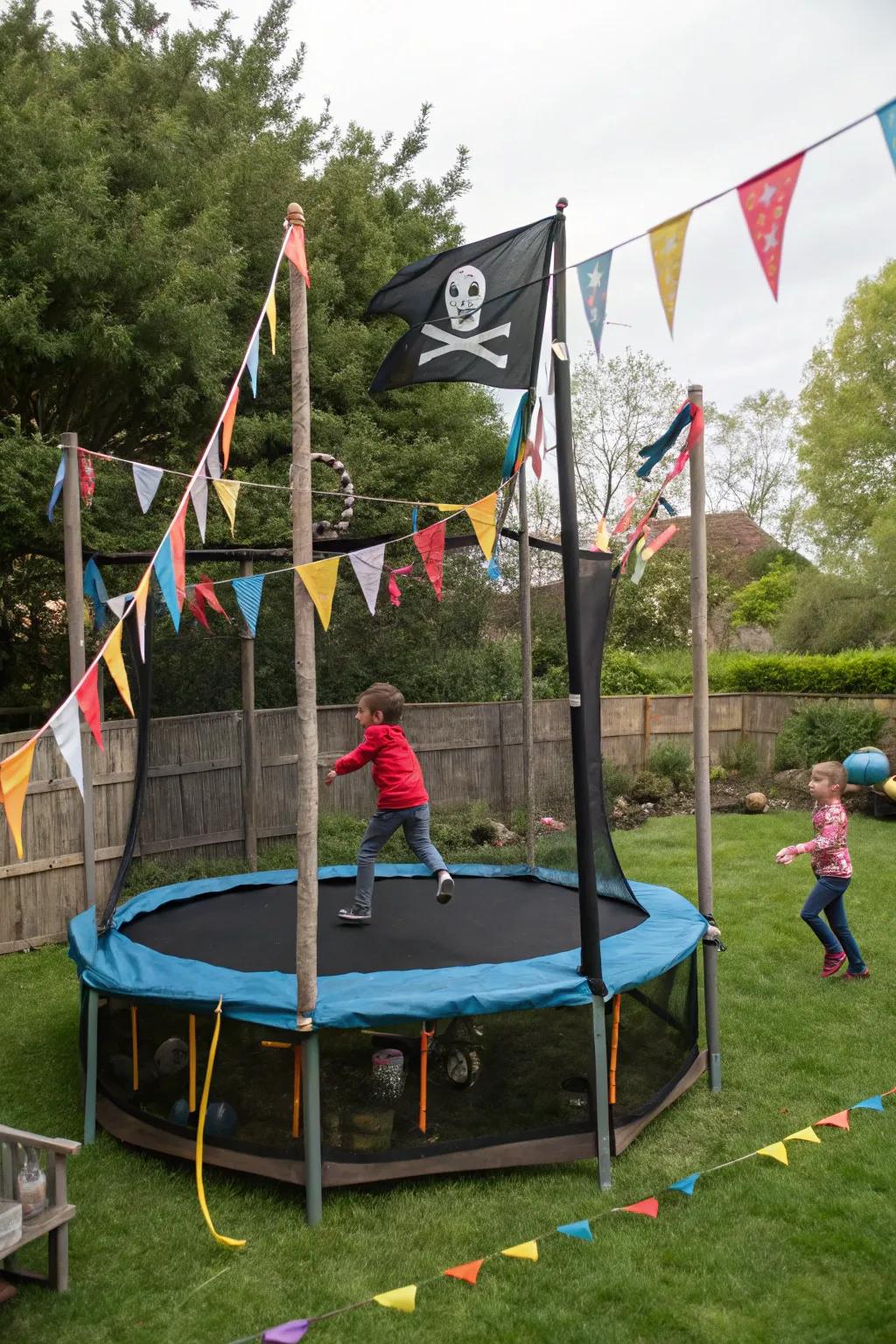 A bounce bed transformed into a themed play zone with colorful decorations.
