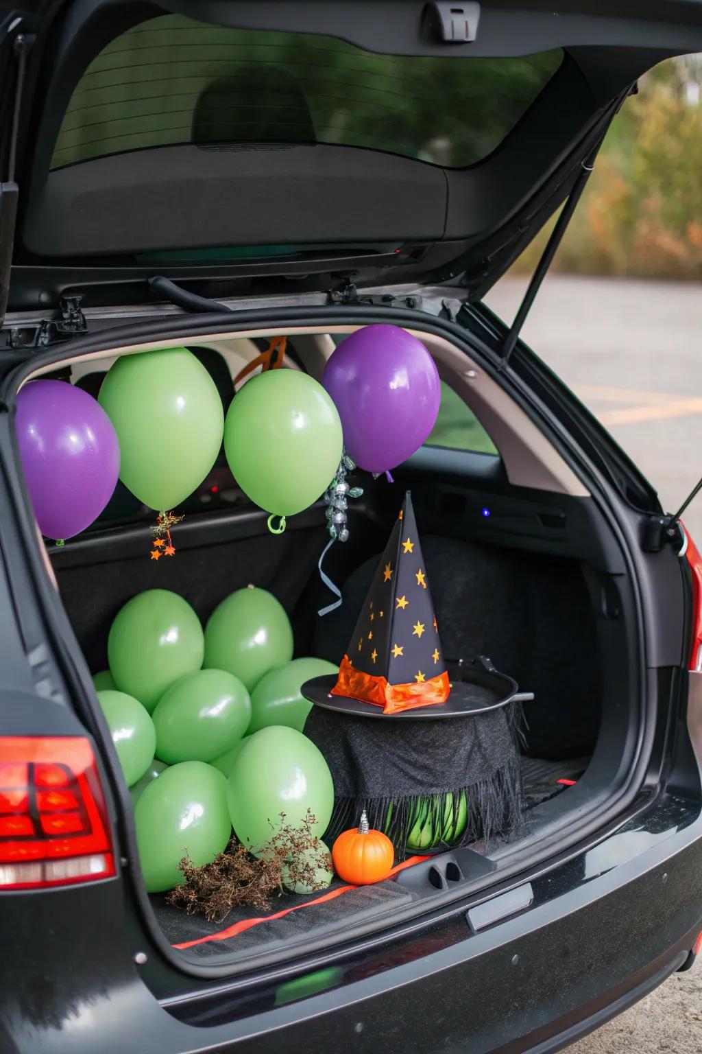 Balloons add a whimsical pop of color to your witch theme.